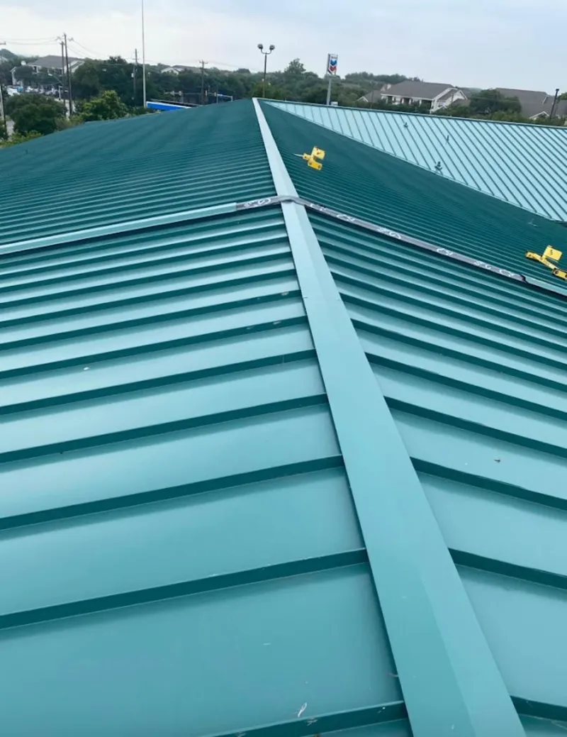 Green commercial metal roof ridge and valley for Metal Roof Repair in Pendleton